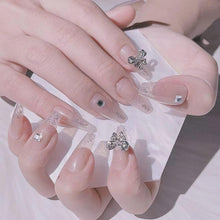 Long Glossy Press on Nails Nude French Coffin Fake Nails Full Cover Ballerina Nails with Diamonds and Shiny Bow Design for Women and Girls(24 PCS)
