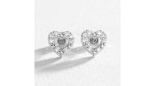 Pure Brilliance Sterling Silver 0.15ct Diamond Stud Earrings