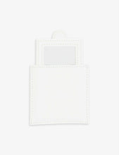 Compact bonded-leather mirror