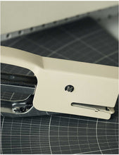 Silver-toned plier stapler