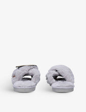 Eye-embellished faux-fur slippers