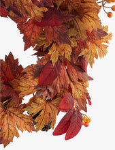 Leaf and pinecone woven Christmas wreath