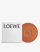 Anagram-embossed ceramic candle lid