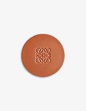 Anagram-embossed ceramic candle lid